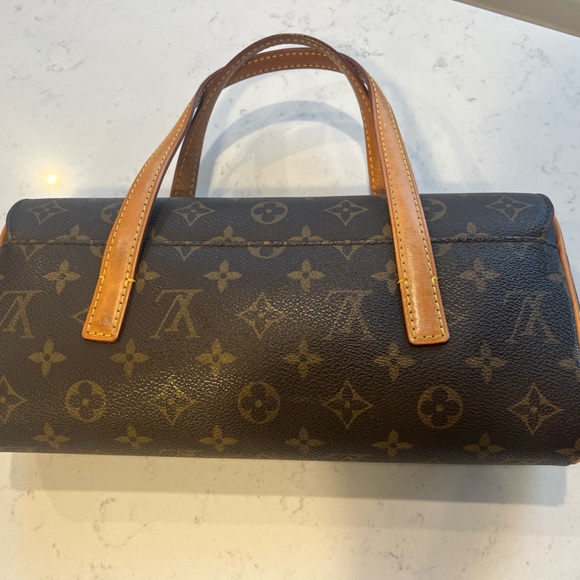 Authentic Louis Vuitton Sonatine in Monogram - Picture 2 of 9